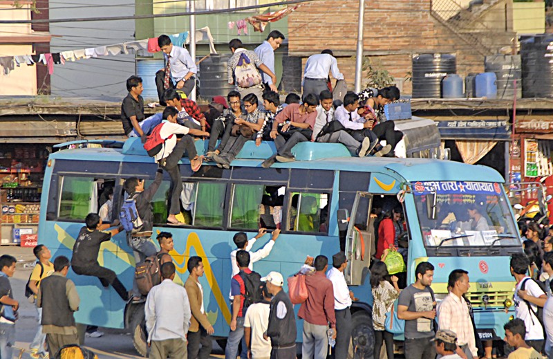 Passengers-on-roof-Old-Bu-1634545298.jpg